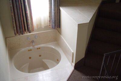 The hot tub on the stairs.
