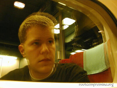 Self-Portrait in the reflection of the train.