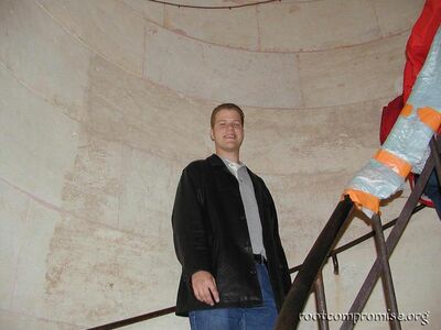 Me on the stairs in the Arc de Triomphe.
