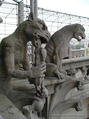 Gargoyle eating what looks like a chicken.