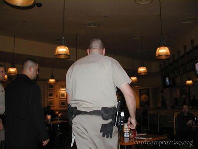 What he didn't know was that four cops were having dinner on the other side of the restaurant.