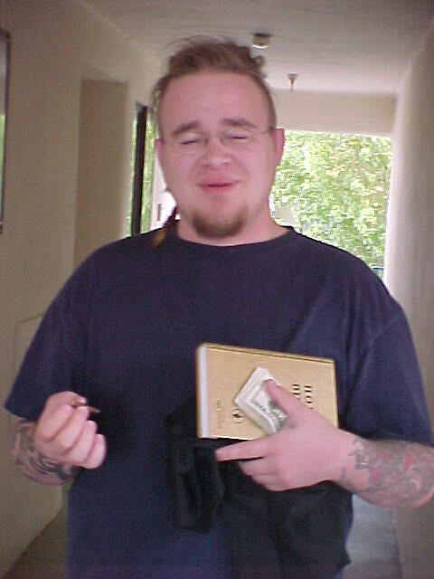 Kenny, Money, a bible and some cloves.