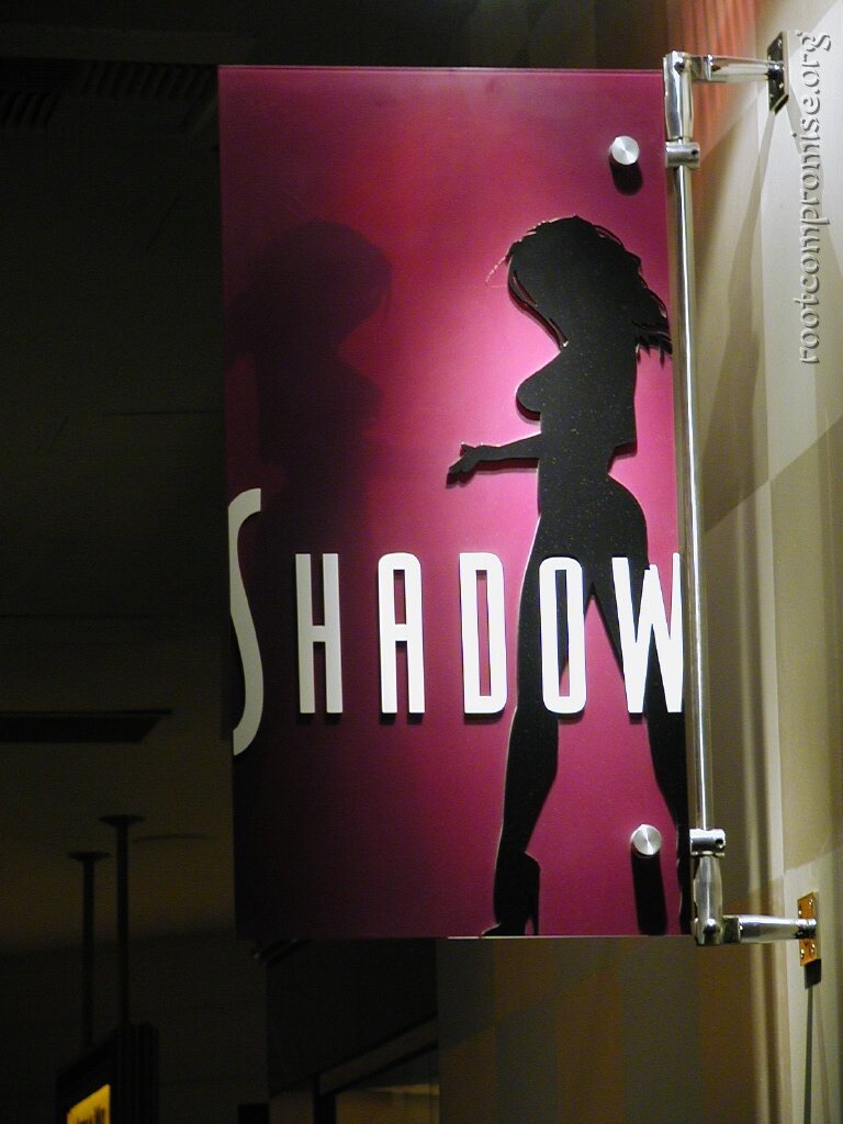 The Shadow Bar.  Nice place where women dance behind screens to music.  Good conversation, music, and eye candy.